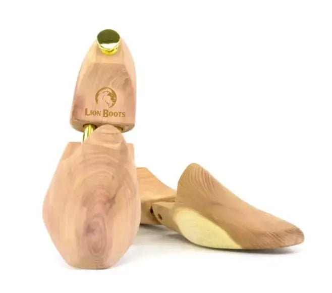 Wooden shoe trees with 'Lion Boots' branding