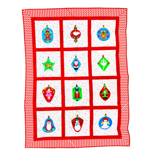 A square quilt or blanket with a red and white chevron border and a 3x4 grid of white panels, each featuring a colorful Christmas ornament illustration in red, green, blue, and gold.