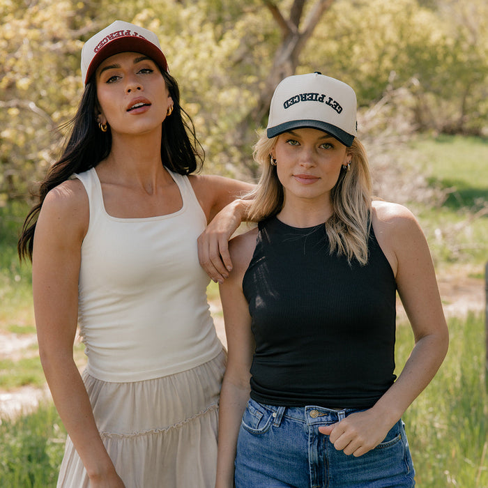 Get Pierced Trucker Hat in Berry