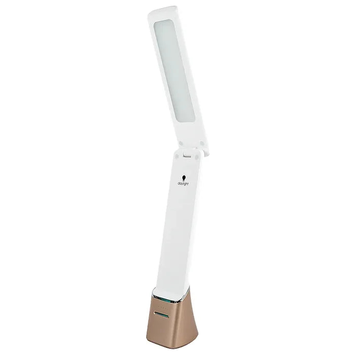 White and gold lamp on a white background